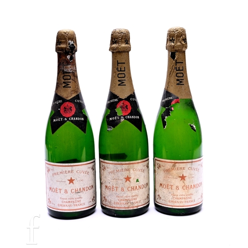 98 - Three bottles of 1960s Moet & Chandon champagne. (3)