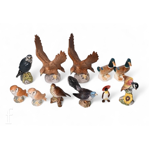 470 - A collection of Beswick bird figures, to include a Merlin Beneagles whisky flask, height 17cm, Golde... 