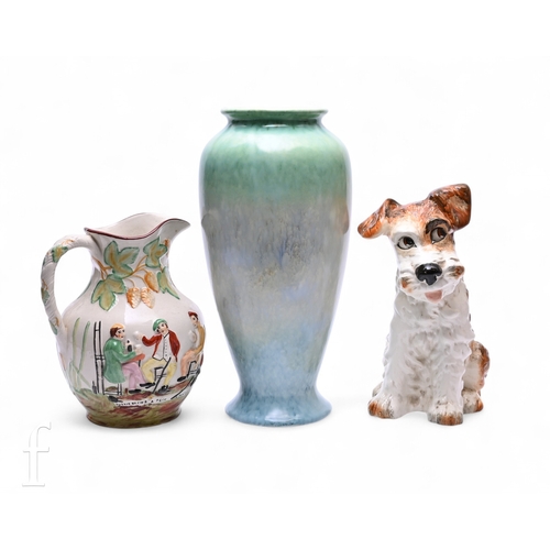 472 - A Sylvac model of a terrier, modelled sitting, number J380, height 29cm, together with a Sylvac vase... 