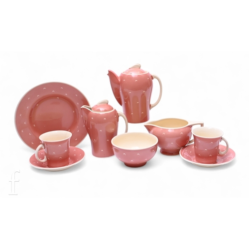 481 - A Susie Cooper 'Pink Crescent' early morning breakfast set, comprising Kestrel shape coffee pot, hot... 