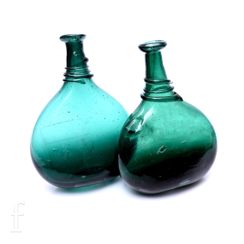 758 - A near pair of 18th Century Persian saddle flasks circa 1725 to 1800, each of compressed ovoid form ... 