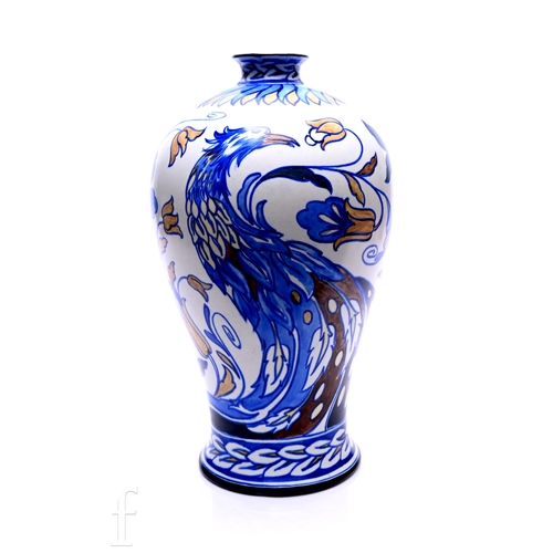493 - An early 20th Century large Wardle Pottery vase designed by Frederick Rhead, the footed baluster for... 