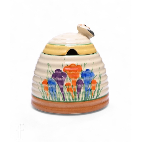 497 - A Clarice Cliff Crocus Bee Hive honey pot circa 1936, hand painted with Crocus sprays with green, ye... 