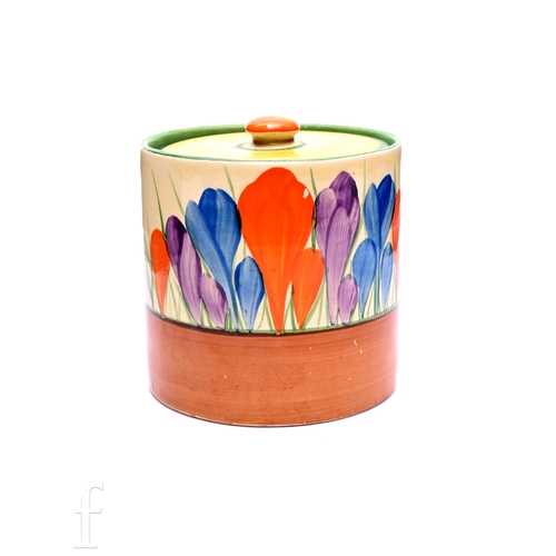 498 - A Clarice Cliff size 3 drum shaped preserve circa 1930, hand painted with Crocus sprays with yellow,... 