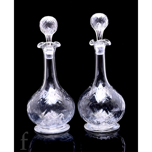 761 - A pair of early 20th Century Thomas Webb & Sons crystal glass decanters in the Ribonnette patter... 