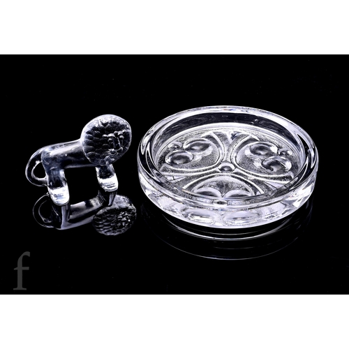 816 - A large 1960s clear crystal pressed glass bowl of shallow circular form designed by Lars Hellsten fo... 