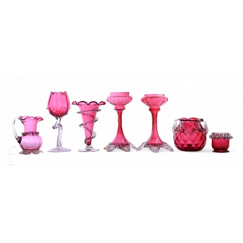 702 - A collection of Victorian ruby glass, to include a near pair of stem vases, optical moulded bowled c... 