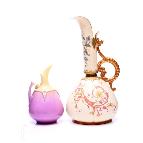 486 - A Royal Worcester Prismatic Enamel ewer, of ovoid form with drawn neck and high drawn spout, graded ... 