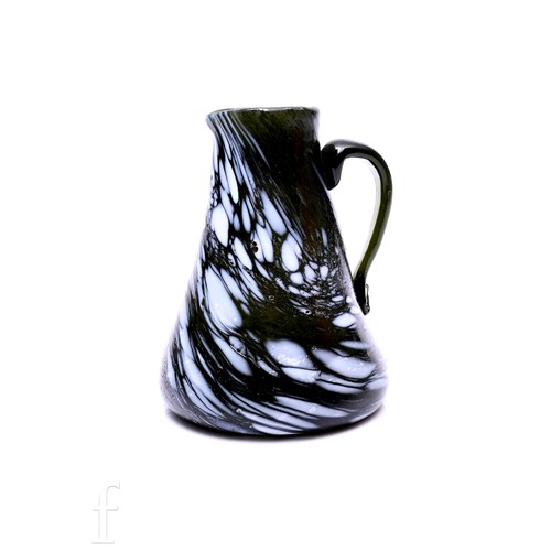 720 - A late Georgian Wrockwardine type jug of squat form with a tapered neck and applied loop handle, dec... 