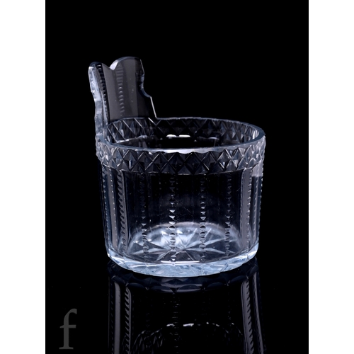 719 - A late Georgian Piggin circa 1800, the cylindrical base with slice and notch cut decoration below a ... 