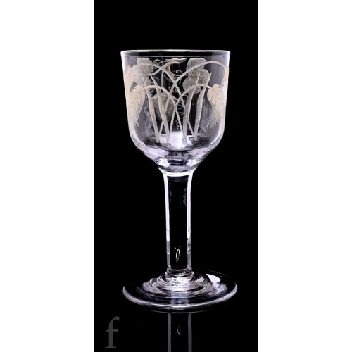 726 - A large 18th Century goblet circa 1740, the ogee bowl engraved with hops and barley above a plain st... 