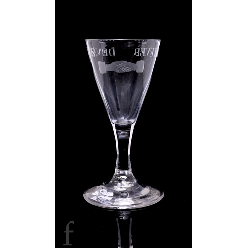 728 - An 18th Century political drinking glass circa 1774, the conical bowl engraved with clasped hands be... 