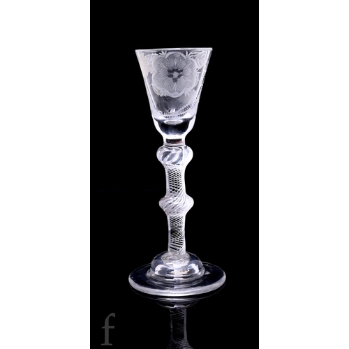 730 - An 18th Century Jacobite drinking glass circa 1745, the small round funnel bowl with solid base sect... 