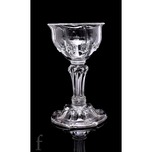 738 - An 18th Century sweetmeat dish circa 1770, the fluted and lipped ogee form bowl above a baluster Sil... 