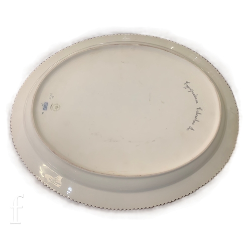 478 - A Royal Copenhagen Flora Danica serving plate, of oval form, hand painted with botanical study of Cy... 