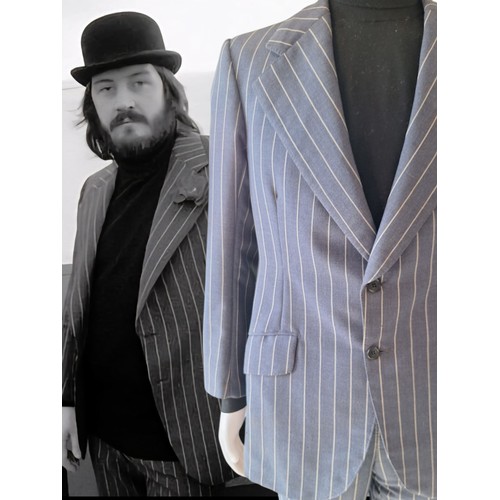 John Bonham / Led Zeppelin - A 1970s pinstripe suit owned and worn by John Bonham, with inside pocket label 'Made by John Robinson of Redditch', with handwritten 'John Bonham Esq 1974'. 