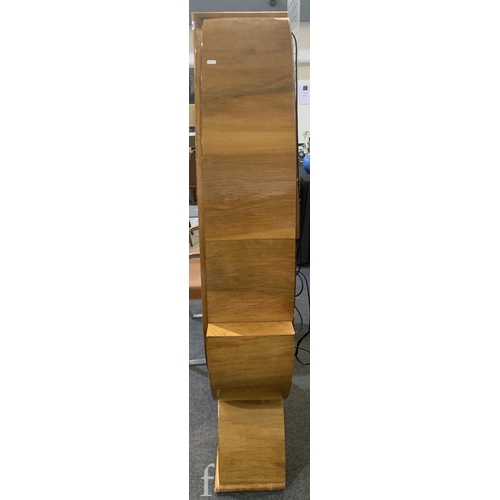 738 - Unattributed Maker - An Art Deco walnut veneered display cabinet of stylised spearhead form, with le... 