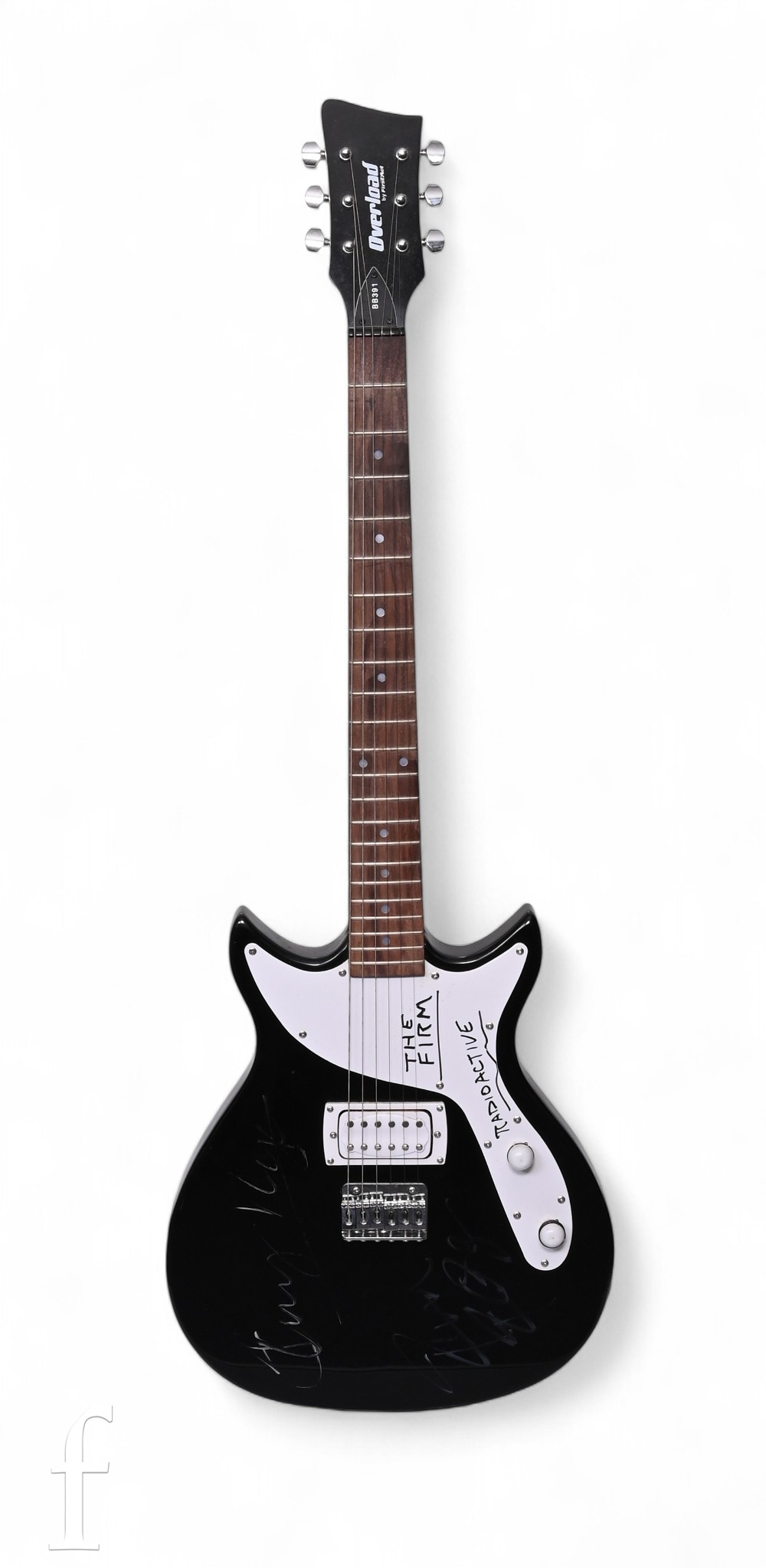 An Overload First Act electric guitar in black colourway, the lower ...