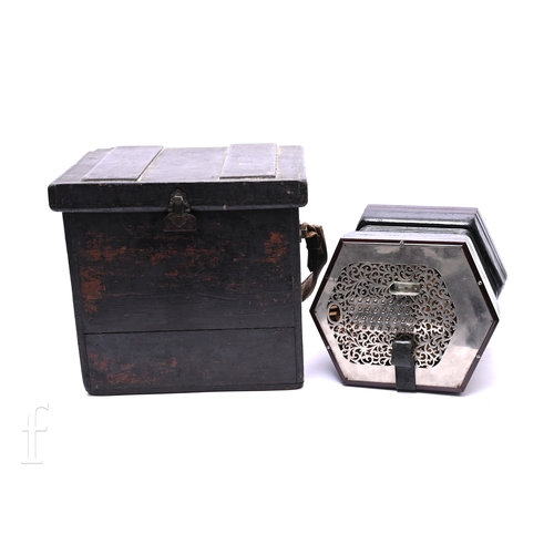 480 - A late 19th to early 20th Century octagonal cased concertina, thirty two button operation, in pine c... 