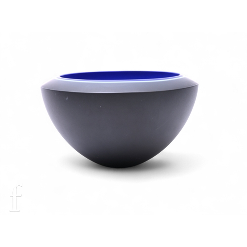 174 - A later 20th Century studio glass bevelled crystal bowl by Rachael Woodman, of high sided and thick ... 