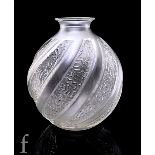 182 - A 1930s French pressed glass vase of globular form with spiral panelled design with raised vermicell... 