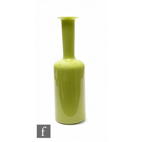 192 - A post war Italian glass vase, of shouldered bottle form in lime green colour, unmarked, height 35cm... 