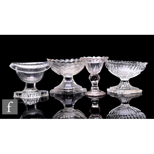 195 - A collection of 18th Century clear crystal glass table salts to include a roll rim example with quat... 