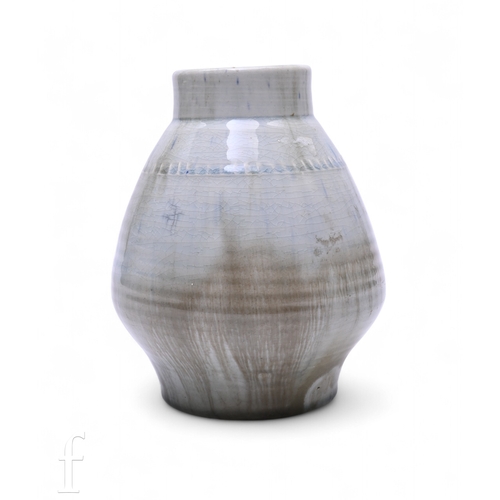 192 - In the style of William Moorcroft, a natural ware vase, of ovoid form with textured band, in graded ... 