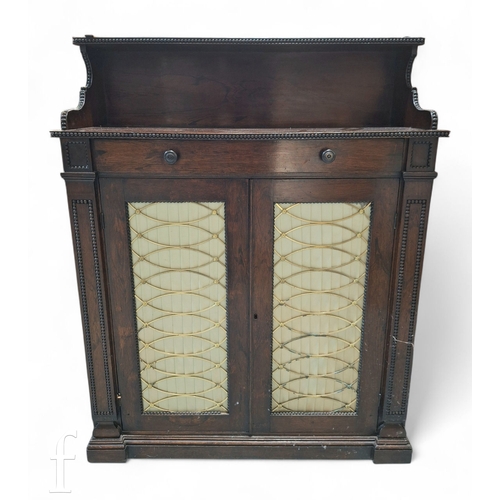 1233 - A 19th Century rosewood chiffonier of small proportions, with a galleried upright above a single fri... 