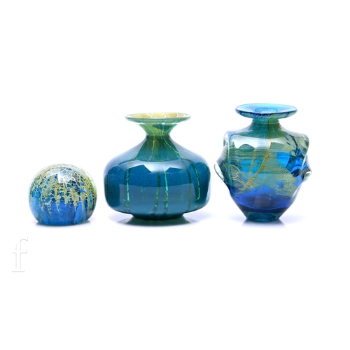 396 - A Mdina eared glass vase of shouldered ovoid form with collar neck and flat rim, cased in clear crys... 