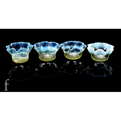 430 - A group of early 20th Century Arts & Crafts straw opal bowls of circular section with frill rim ... 