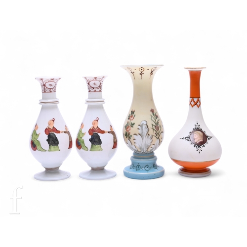 486 - A pair of late 19th Century opal vases of footed baluster form with a tapered collar neck, each hand... 