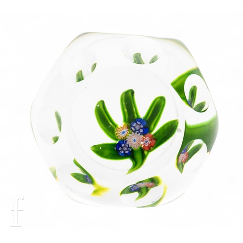 598 - A small classic period French paperweight by St Louis, the clear crystal dome with facet cut printie... 