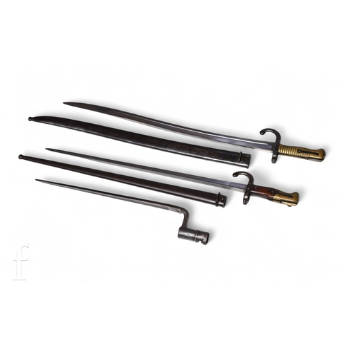 1001 - Two 19th Century French chassepot bayonets the blades inscribed and dated 1873 and 1879, each with a... 