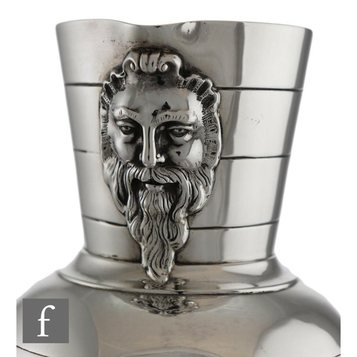 1774 - A Victorian hallmarked silver water jug and two matching goblets, Martin Hall & Co, London 1873 ... 