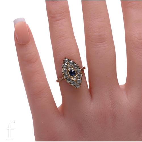 3 - A late Victorian sapphire and diamond ring, circa 1890, the circular mixed-cut sapphire within a mar... 