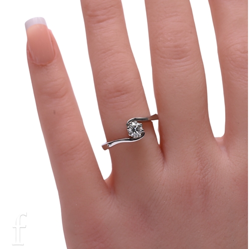 36 - A single stone diamond ring, the brilliant-cut diamond weighing 0.38 carats, eight claw set above cr... 