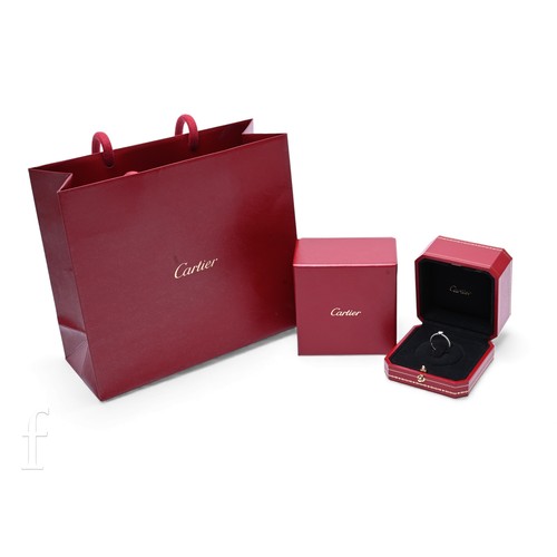 49 - Cartier; A diamond ring, the brilliant-cut diamond weighing 0.23 carats and of D colour between diam... 