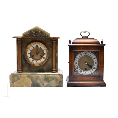 697 - An Edwardian green onyx mantle clock of classical form eight day striking movement on a gong and a m... 