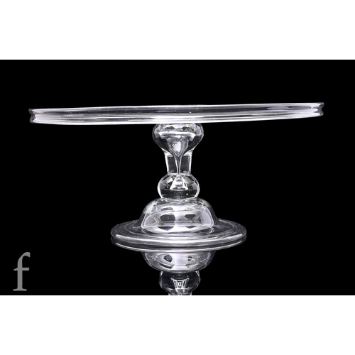 235 - A later 18th Century clear crystal glass tazza circa 1760, the wide circular top with collar rim, ra... 