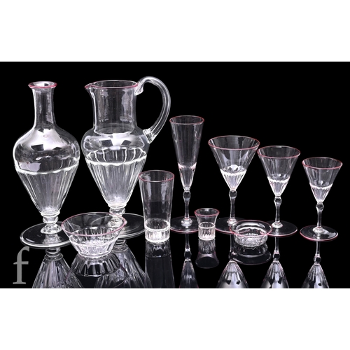 237 - A large suite of Salviati &Co Venetian glass drinking wares, the clear bodies with fluted basal ... 