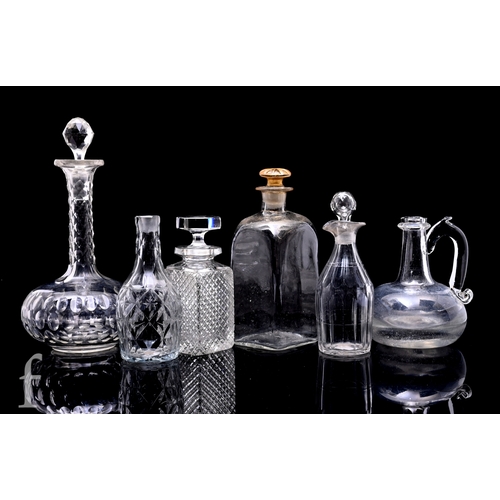 266 - A 19th Century clear crystal globe and shaft decanter with printie cut triple band, below diaper cut... 