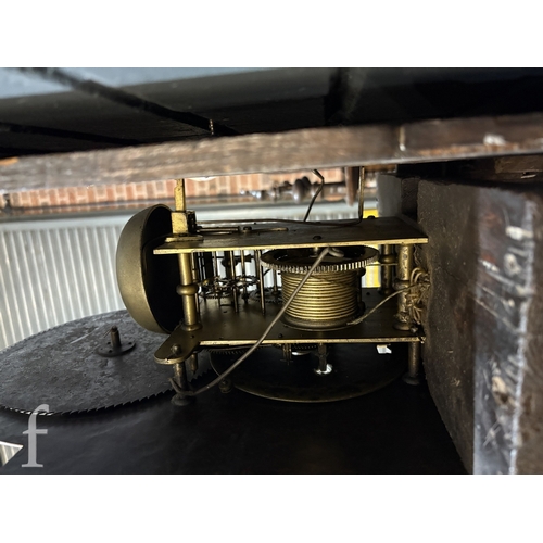 712 - A George III and later longcase clock with eight day movement, the oak case later carved profusely w... 