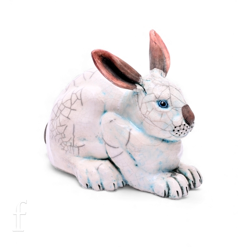 25 - A Contemporary British Sarah Rudge raku pottery figure of a hare, modelled seated, unsigned, height ... 