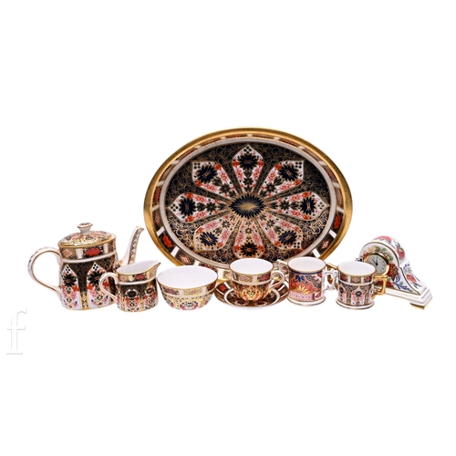 32 - A Royal Crown Derby Old Imari pattern miniature teapot, printed red marks and No.1128 height 8cm, an... 