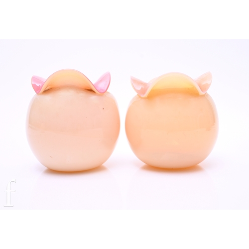 278 - A 19th Century globe form vase with nipped and folded everted rim, uranium opal over graded pink, he... 