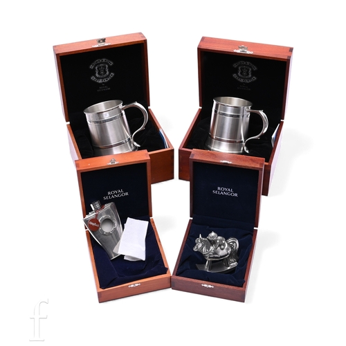 580 - A group of four boxed Royal Selangor items, to include a hip flask, novelty rocking horse and two Cr... 