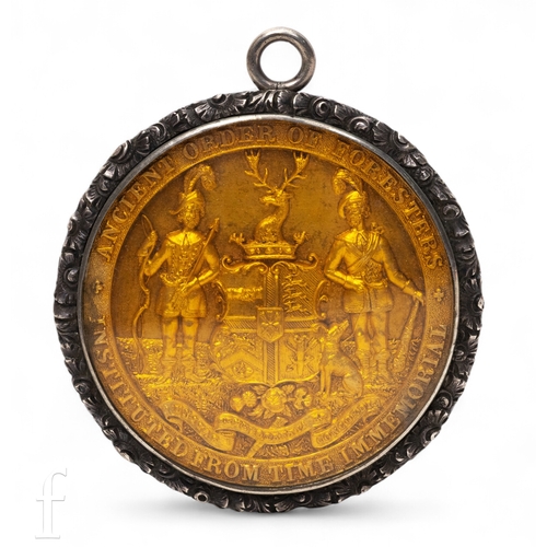 623 - A Victorian gilt medallion for the Ancient Order of the Foresters, in silver frame with suspension l... 