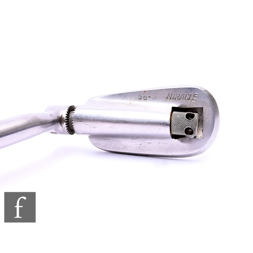 627 - A steel shafted Miracle 38 inch golf putter, rubber grip, length 101cm.