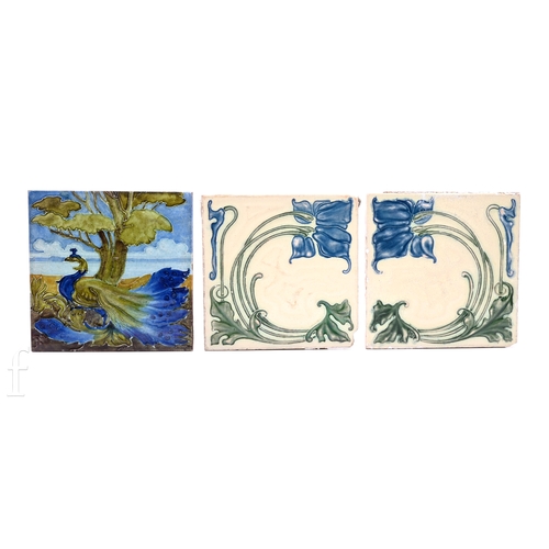 69 - A Carter & Co 6 inch dust pressed tile, faux tubelined with peacock in rural landscape, in tonal... 